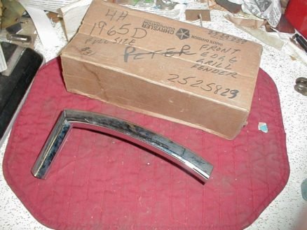 NOS Mopar Left Headlight Surround Moulding 1965 Dodge Polara Monaco