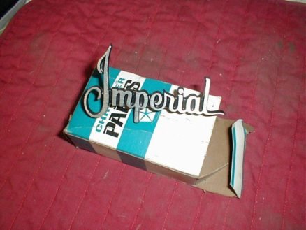 NOS Mopar Headlight Door Nameplate 1970-1 Imperial Models
