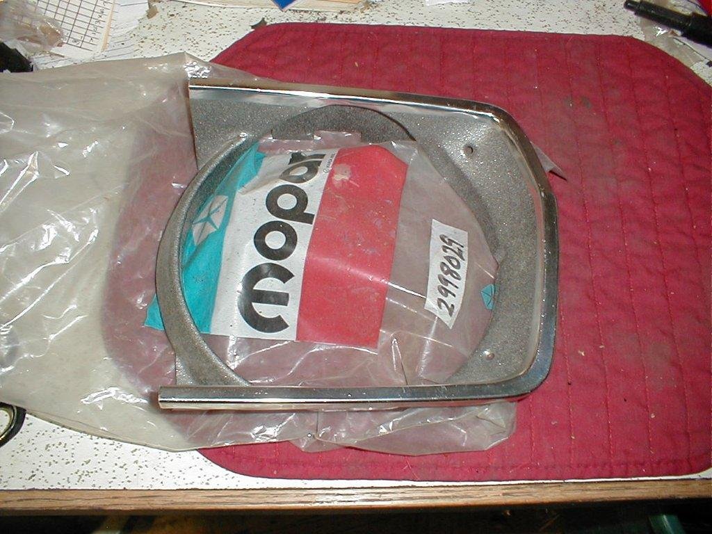 NOS Mopar Left Headlight Bezel 1970 Plymouth Valiant Duster