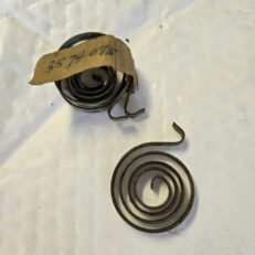 HEADLIGHT DOOR SPRING