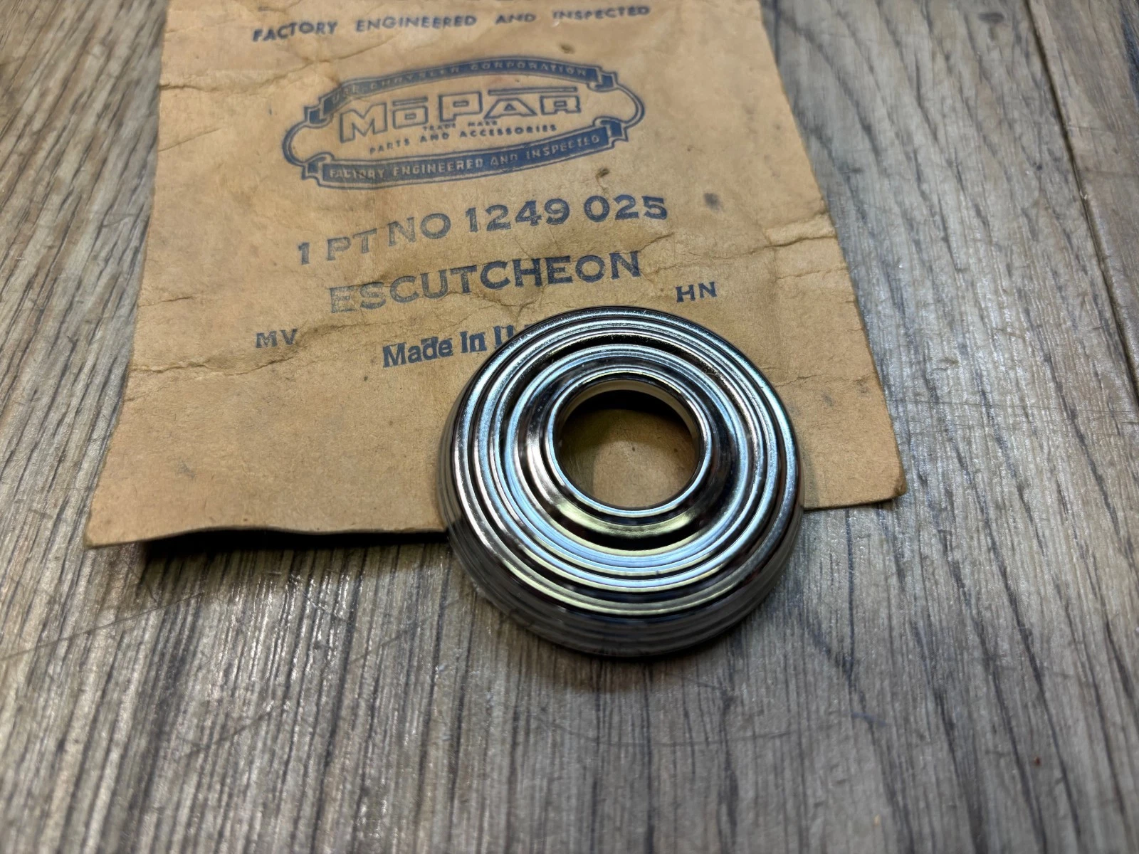 WINDOW ESCUTCHEON