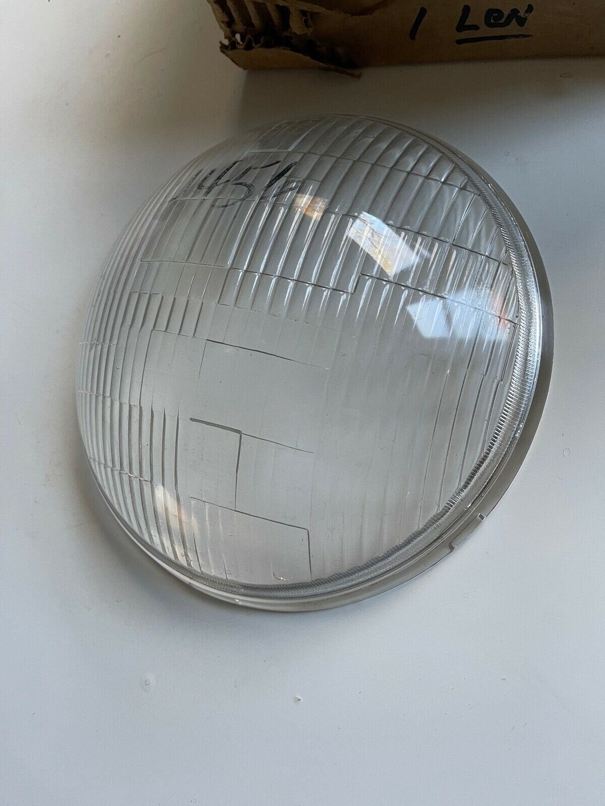 HEADLIGHT LENS