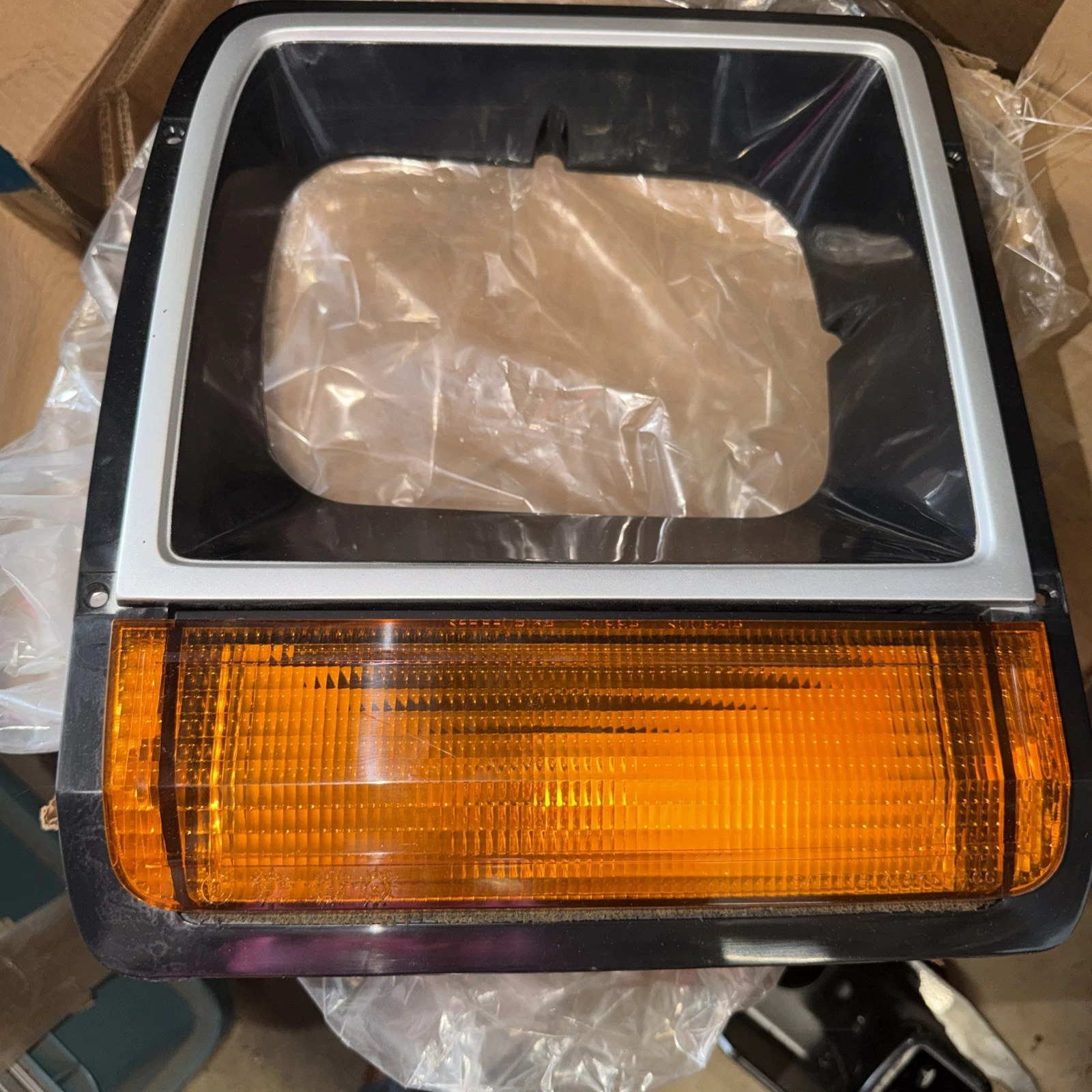 HEADLIGHT BEZEL