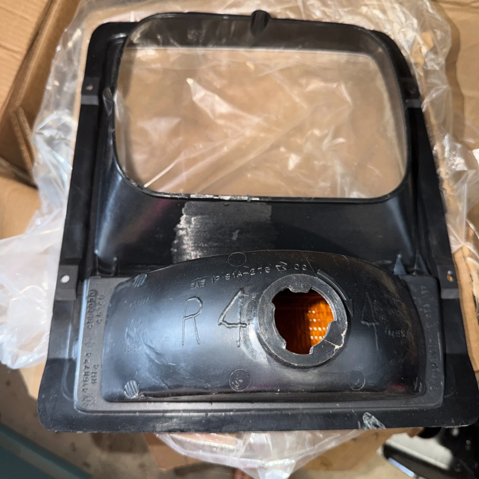 HEADLIGHT BEZEL